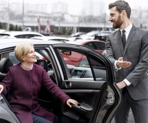 taxi-driver-female-client-interacting-formal-way